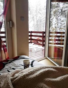 Ένα ή περισσότερα κρεβάτια σε δωμάτιο στο Oaza mira