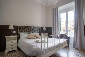 Postel nebo postele na pokoji v ubytování CORVETTO rooms
