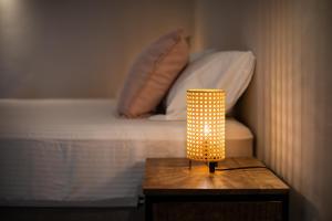 Voodi või voodid majutusasutuse JT Curacao Apartments toas