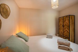 Voodi või voodid majutusasutuse JT Curacao Apartments toas