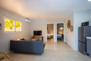 Televiisor ja/või meelelahutuskeskus majutusasutuses JT Curacao Apartments