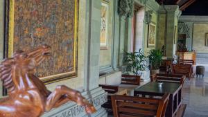 Ein Sitzbereich in der Unterkunft Sakti Garden Resort & Spa