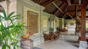 Ein Sitzbereich in der Unterkunft Sakti Garden Resort & Spa
