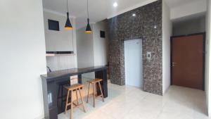 Kuchyň nebo kuchyňský kout v ubytování Shofa boarding house syariah