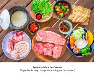 a table topped with different types of food on plates at ITOSHIMA SDGs Village Chikyu MIRAI -Floating Art room or Bali Forest room- in Itoshima