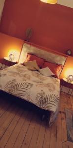 Postel nebo postele na pokoji v ubytování Gîte des Frangines