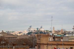 a view of a city skyline with buildings at Tiber Rooms Testaccio in Rome