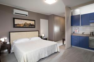 Postel nebo postele na pokoji v ubytování Quadra Key Easy Home In Florence