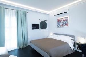Postel nebo postele na pokoji v ubytování Quadra Key Easy Home In Florence