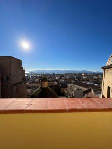 a view of a city from the roof of a building at Studio Apartments Centro Storico Via Manno in Cagliari