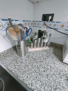 A kitchen or kitchenette at Tirwal Suite San Juan