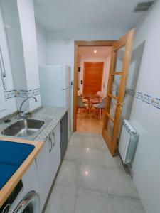 A kitchen or kitchenette at Tirwal Suite San Juan