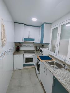 A kitchen or kitchenette at Tirwal Suite San Juan