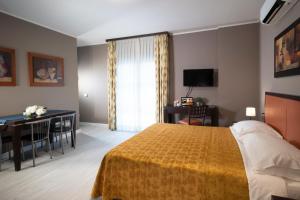 Postel nebo postele na pokoji v ubytování Quadra Key Easy Home In Florence