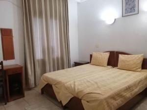 Postel nebo postele na pokoji v ubytování Hotel El Layeli