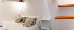 Łóżko lub łóżka w pokoju w obiekcie Adorable apartamento en Almagro