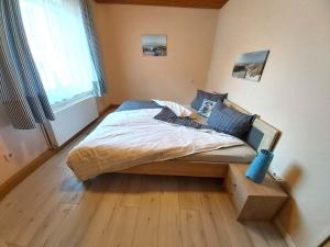 Postel nebo postele na pokoji v ubytování Haus Schwalbennest