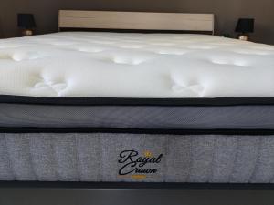 Posteľ alebo postele v izbe v ubytovaní Silver Pearl Apartment