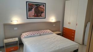 Ένα ή περισσότερα κρεβάτια σε δωμάτιο στο RESIDENCE AL CAVALLINO +17 φωτογραφίες