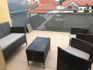 Balkón alebo terasa v ubytovaní MF City Apartment