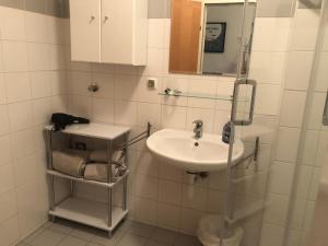 Kúpeľňa v ubytovaní MF City Apartment