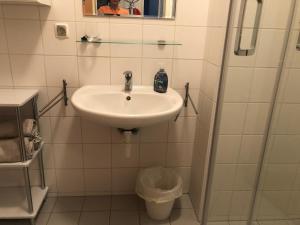 Kúpeľňa v ubytovaní MF City Apartment