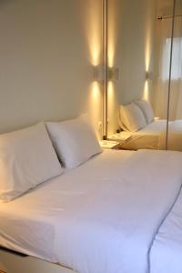 A bed or beds in a room at Aelia Apartment 2 Ioannina