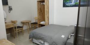 TV a/nebo společenská místnost v ubytování K Bình Phương Hotel + 37 fotografií
