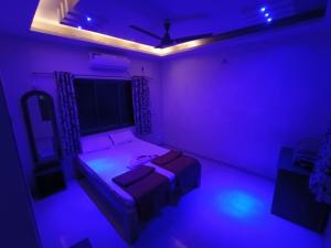 Letto o letti in una camera di Konkan Villa Dream