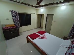 Letto o letti in una camera di Konkan Villa Dream