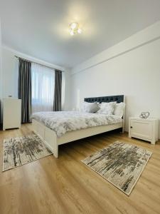 מיטה או מיטות בחדר ב-Luxury Apartment with Sunset View Palas