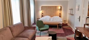 Un pat sau paturi într-o cameră la Hotel St. Josef