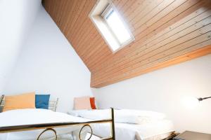 Voodi või voodid majutusasutuse Centra Hotel Zurich toas
