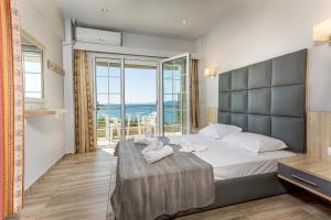 Postel nebo postele na pokoji v ubytování Paradisos Holiday