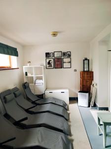 A bed or beds in a room at Chalupa Nad Lipou - Čičmany, turistika, sauna, krb