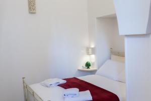 Letto o letti in una camera di Suite Dantè - Typical Apulian Rooms