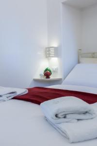 Letto o letti in una camera di Suite Dantè - Typical Apulian Rooms