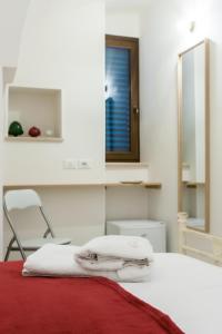 Letto o letti in una camera di Suite Dantè - Typical Apulian Rooms