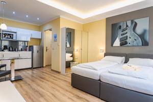 Kuchyň nebo kuchyňský kout v ubytování VillaJazz Apartments