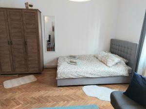 Postel nebo postele na pokoji v ubytování GM Apartment, free private parking