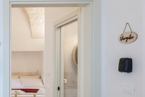 Letto o letti in una camera di Suite Dantè - Typical Apulian Rooms