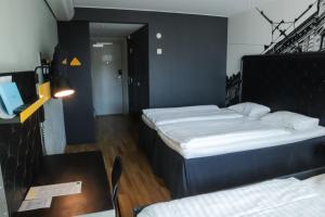 Postel nebo postele na pokoji v ubytování Comfort Hotel Göteborg