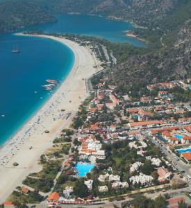 an aerial view of a beach and the ocean at Belcekiz Beach Club - All Inclusive in Oludeniz