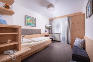 Postelja oz. postelje v sobi nastanitve Hotel Garni Entstrasser