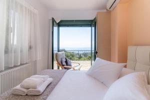 Posteľ alebo postele v izbe v ubytovaní Sapphire Blue Villa