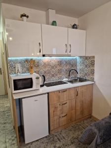 Кухня або міні-кухня у New Gudauri, Apartment 244