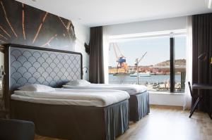 Postel nebo postele na pokoji v ubytování Comfort Hotel Göteborg + 37 fotografií