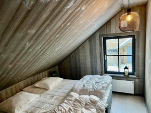Postel nebo postele na pokoji v ubytování Kåvanstugan Funäsdalen