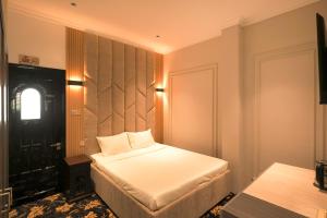 เตียงในห้องที่ Phước Hưng 3 Hotel