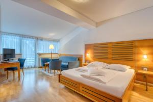 Postel nebo postele na pokoji v ubytování Hotel Cevedale